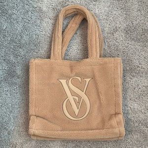 Fuzzy victoria secret bag, tan color, large inside, never been used